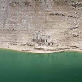 Ghost houses emerging from the artifical lake of Ca' Selva 